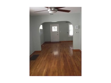 Formal Dining Room view of entry; wood flooring th