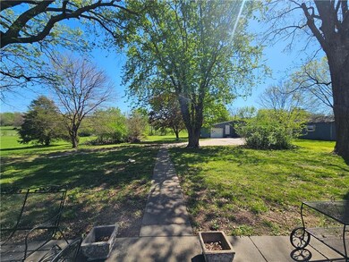 705 N Madison St, Raymore, MO 64083 - photo 3