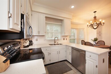 Alternate view of the kitchen/breakfast area.