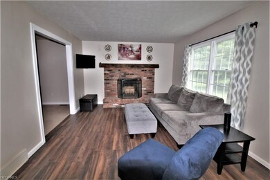 Family Room Boasts an All Brick Wood Burning Firep