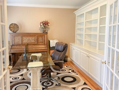 Plenty of storage and display opportunities with a wall of built-ins.