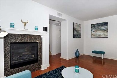 A handsome granite surround accentuates the cozy w