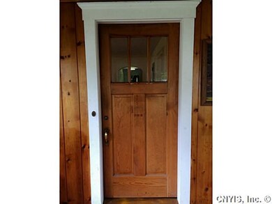 Porch - Enclosed. Front door to the house from the