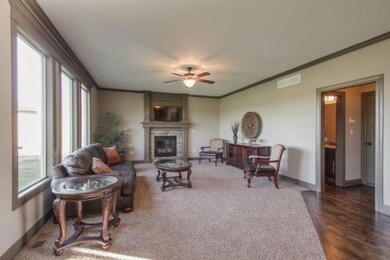 Family room has lots of window for natural light i