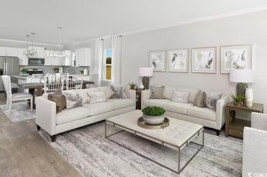 Living room with sink and hardwood / wood-style fl