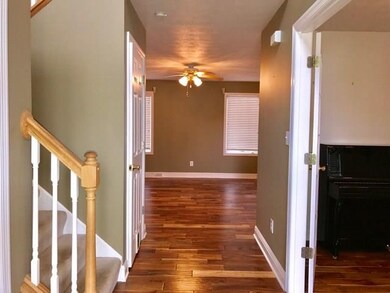 Two story entry complete with a double door coat c