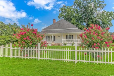 View of front of property with a porch and a front