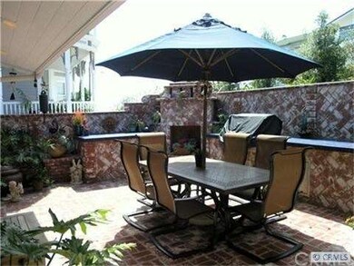 Front patio with fireplace and BBQ area