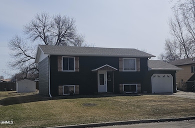 1810 6th Ave NE, Jamestown, ND 58401 - photo 2