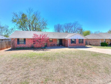 Ranch-style house with a front yard