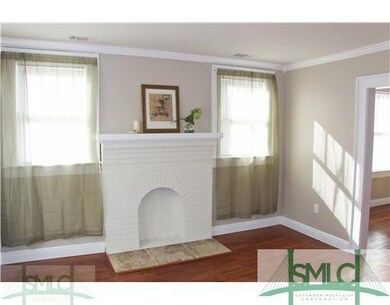 Living Room. Living room with crown molding, wood 