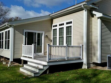 Exterior Back. Only unit with stairs to lawn