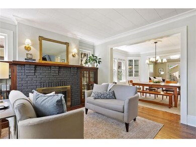 The brick fireplace is the focal point of the room