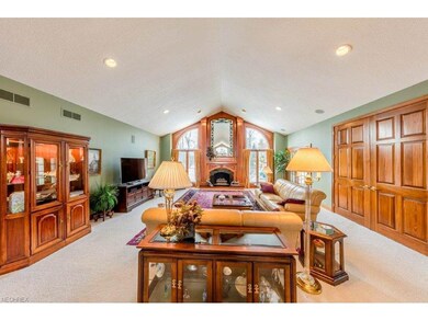 Gorgeous great room with wall of windows and gas f