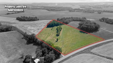 Overview of rural landscape featuring property boundaries highlighted