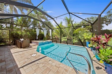 The private backyard backs up to a tall landscaped