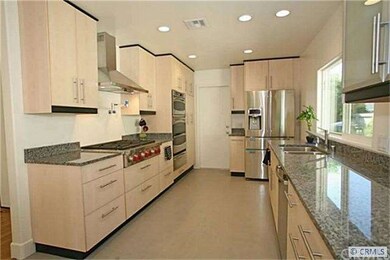 Kitchen with granite counters, dual stainless stee