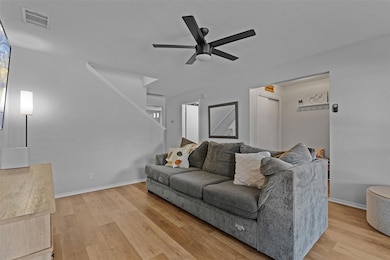 Living area featuring light wood-type flooring, a