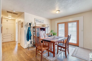 Dining area leads to paver patio