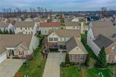 Aerial View showing off the foliage and the well kept neighborhood. 