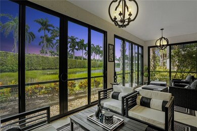 Sunroom / solarium with a chandelier, outdoor lounge area, a water view, and french doors
