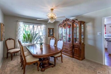 Formal Dining room with pretty fan chandelier and 