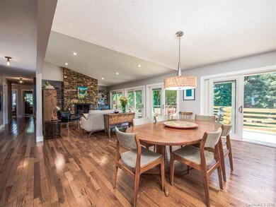 Open concept dining room and living room.