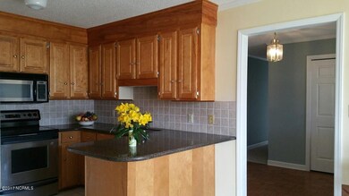 3 kitchen and foyer
