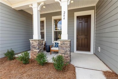 Lovely front porch for coffee or socializing.