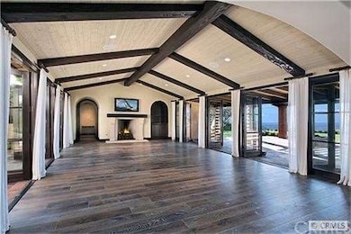 Large great room with rows of French Doors