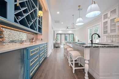 This modern kitchen shines with a spacious island,