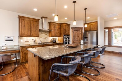 Photos are of a similar home