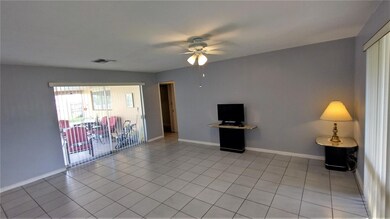living room with view of screen porch