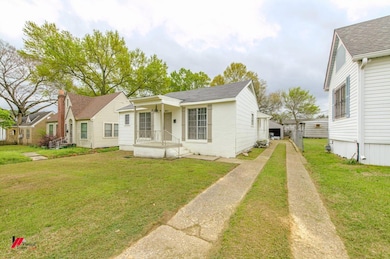 View of front of home with a front yard