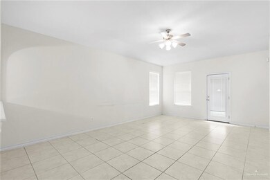 Spare room with ceiling fan