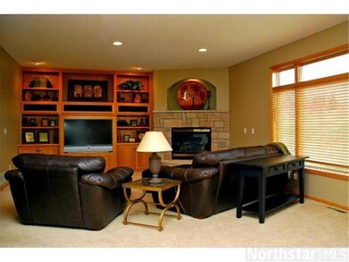 Sunken family room with lots of great built ins in