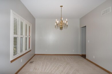 Formal Dining Room. Polywood Shutters on all Windo
