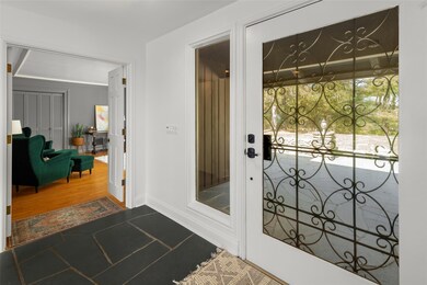 Grand entry, 4'wide front door with wrought iron