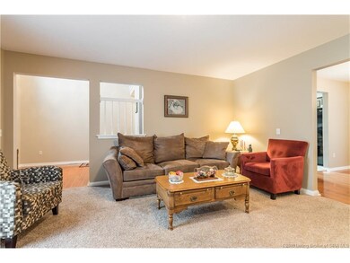 View of the living room into foyer.  Living room f