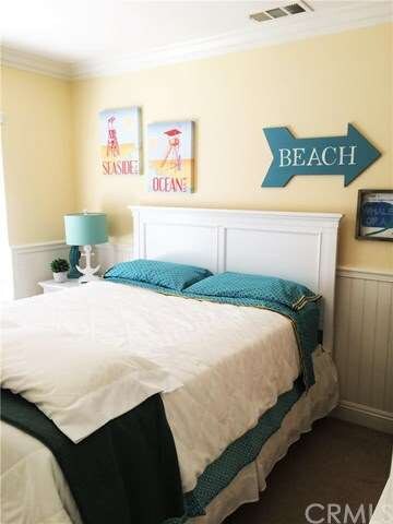Bedroom with Wainscoting all around; Crown Molding