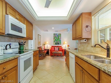 The kitchen has been renovated and overlooks the p