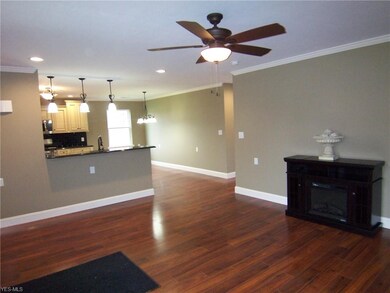 Living area and kitchen view.  Notice all the ligh