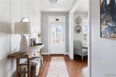 Attractive front door with transom above.