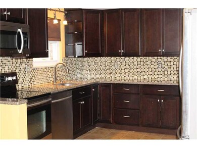 Kitchen. Newer cherry cabinetry, quartz CT; stainl