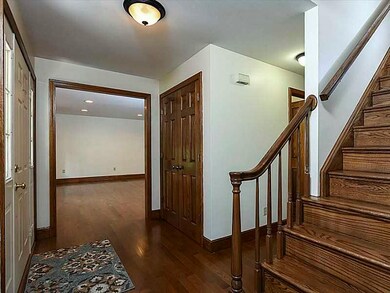 Entry/Foyer. Entry with gleaming hardwood floors and staircase to upper level