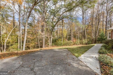 5768 Lost Grove Dr NW, Lilburn, GA 30047 - photo 6