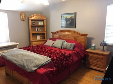 Master Bedroom with Hardwood Floors