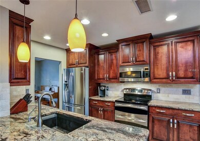 The kitchen is simply stunning - featuring pendant