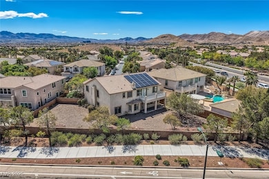Aerial view of residential area with mountains