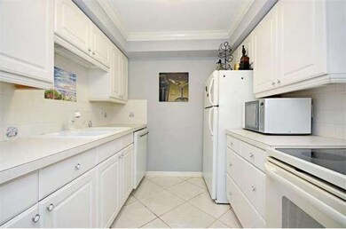 SPACIOUS KITCHEN WITH TRAY CEILING AND CROWN MOLDI